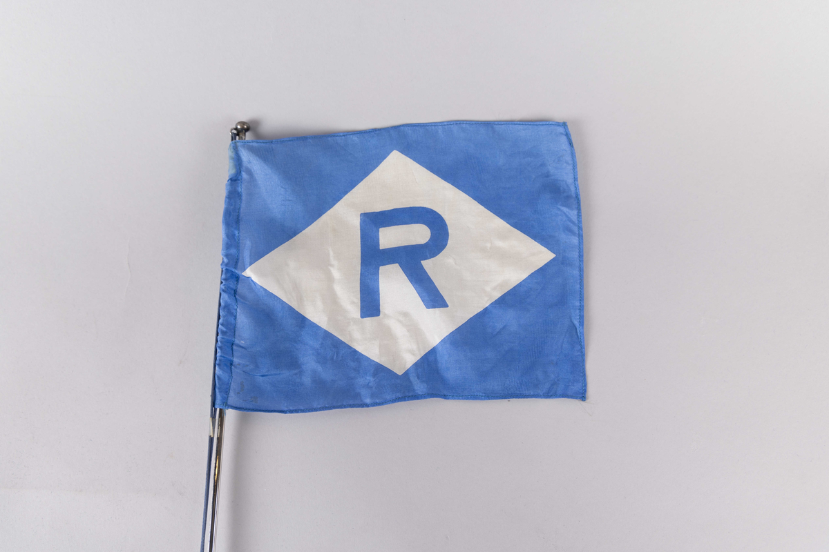 Motiv av skorsteinsmerke til rederiet Einar Rasmussen med bokstaven R