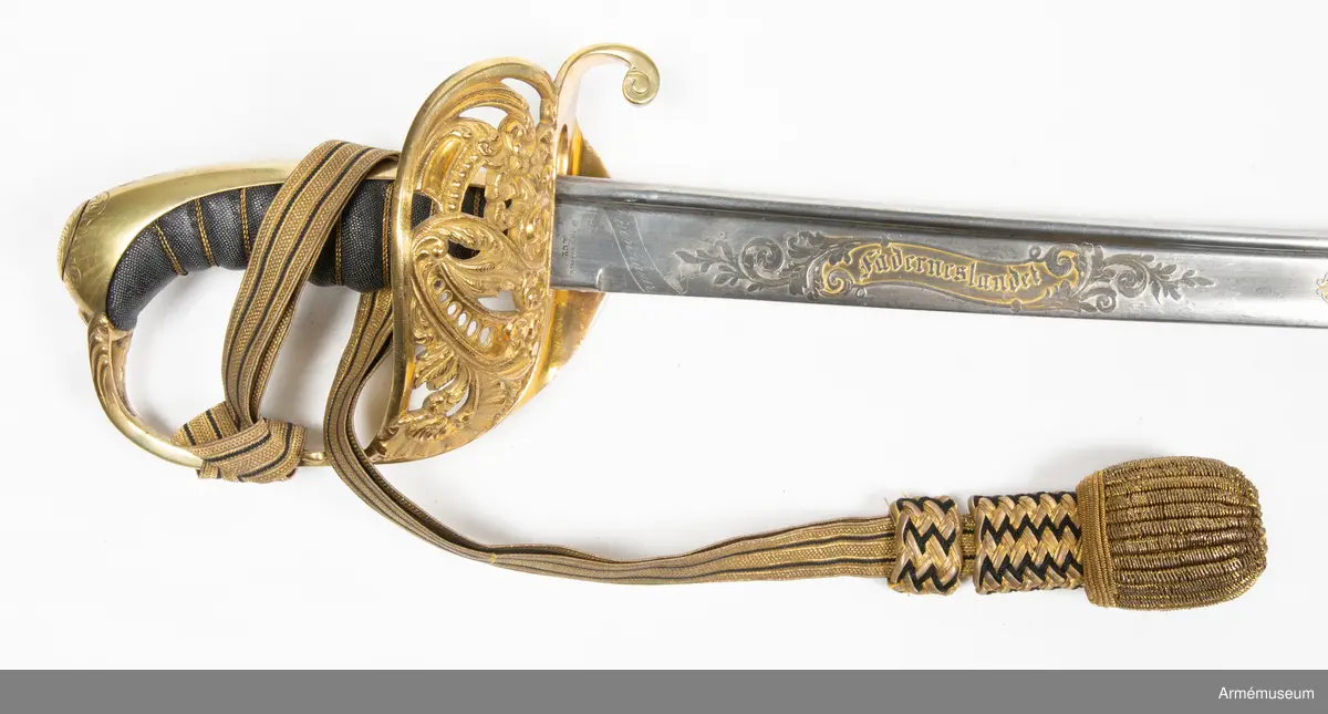 Portepé till sabel m/1859 för infanteriofficer.