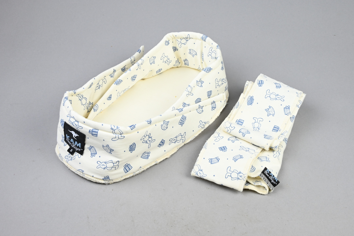 Ekologiskt bäddstöd av bomullssatin, för förtidigt födda barn och sjuka nyfödda som behöver kuvösvård.  Bäddstödet består av en bottenplatta med en huvudända och en fotända. Den består även av en liten filt med ett löst band.  Bäddstödet används för att ge det omogna barnet stöd att hålla ihop kroppen och skydda barnet från ljud- och ljusintryck när barnet vårdas i kuvös och vid olika vårdbehandlingar som kan vara mycket ansträngande för barnet.  Bäddstöden tillverkas i Uppsala av ekologisk bomullssatin. Det är mönsterskyddat (80384) och används sedan 2006 på sjukhus i Sverige, Norge och Spanien.
Tillbehör: Bäddstöd, filt, band