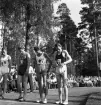 Idrottstävlingar på Värendsvallen, 1944.
Tävlande i löpning förbereder sig inför start.