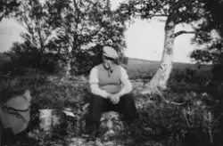 Mann med pipe i munnen