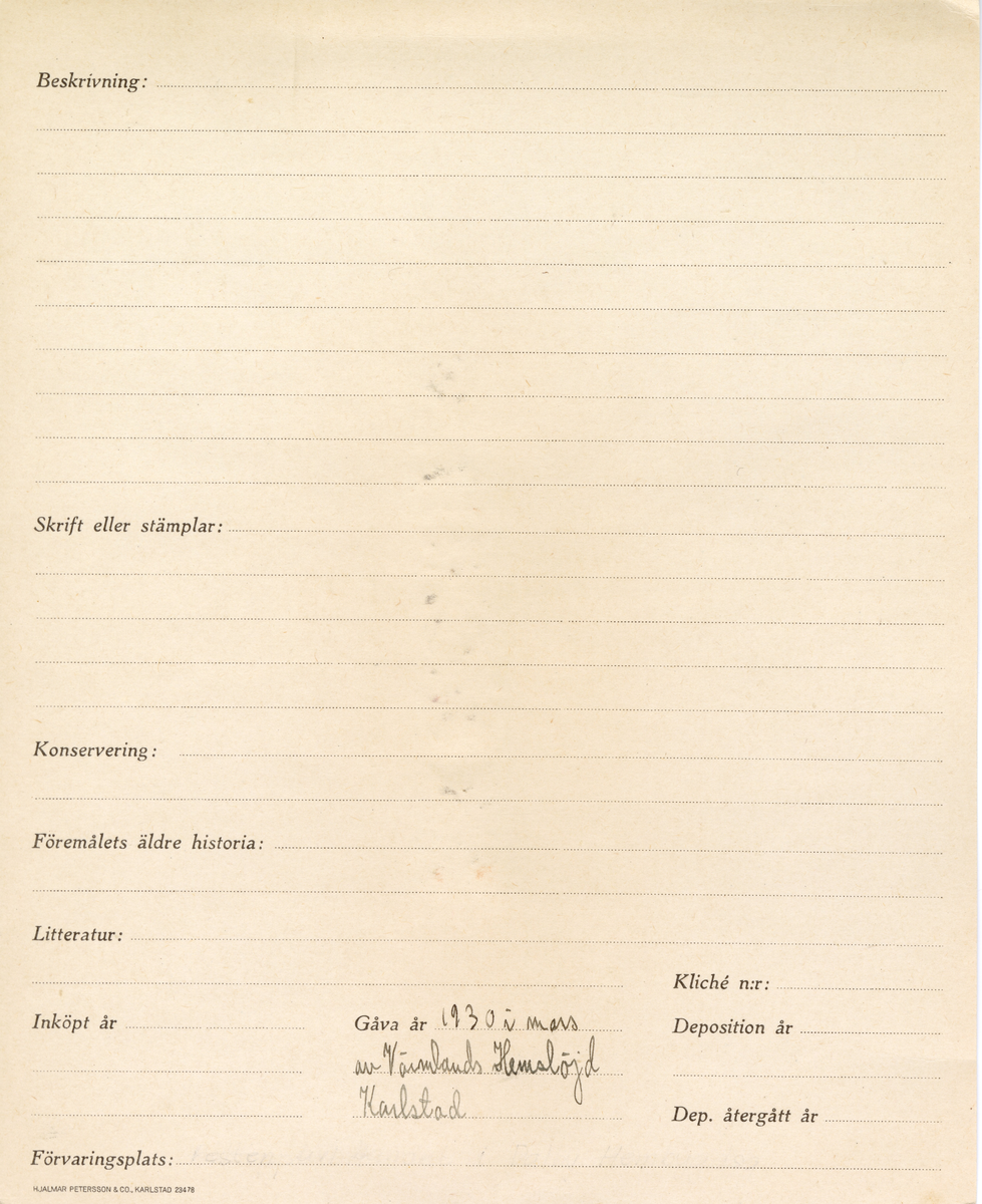 Provbit uppklistrad på kartongark.