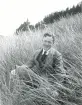 Danmark 1920. Tandläkare Gunnar Högberg sitter i strandvassen vid badorten Huleröd i Danmark.