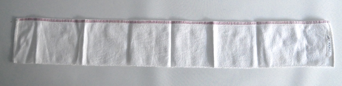 et 75, 0 cm langt og 11, 0 cm breitt tøystykke i bomullsflanell. 