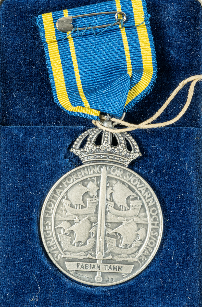 Medalj.