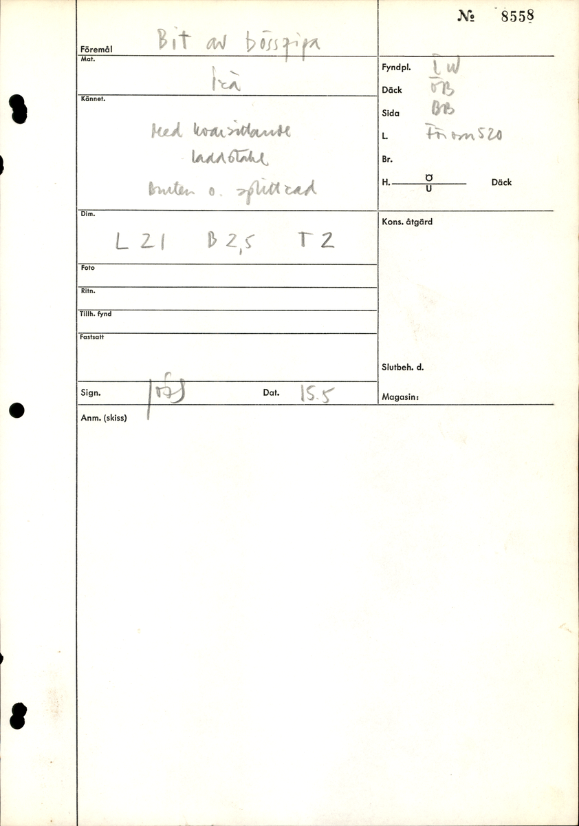 Bit av bösspipa med kvarsittande laddstake. Bruten och splittrad.