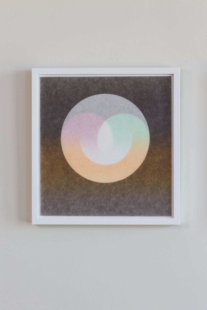 En sirkel med tre halvsirkler inni