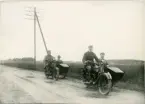 Motorcykel med sidovagn på väg, Uppsala