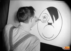 Man tecknar karikatyr av Hitler