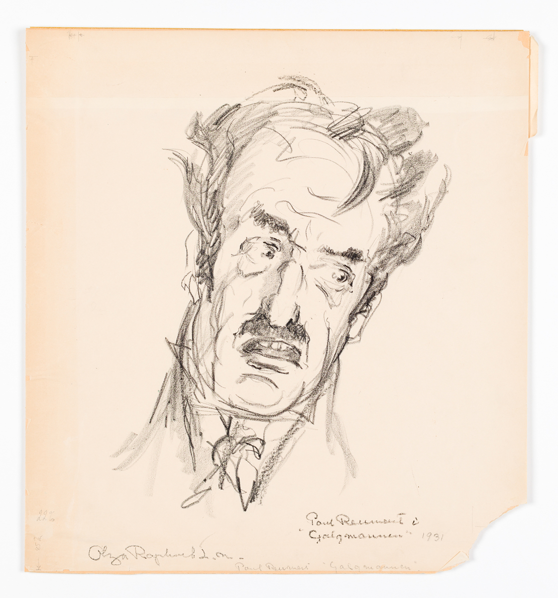 Ett manshuvud med mustasch.
