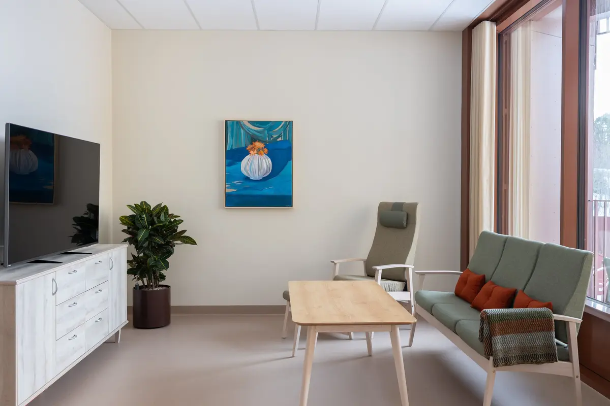 Stilleben av blomster i vase