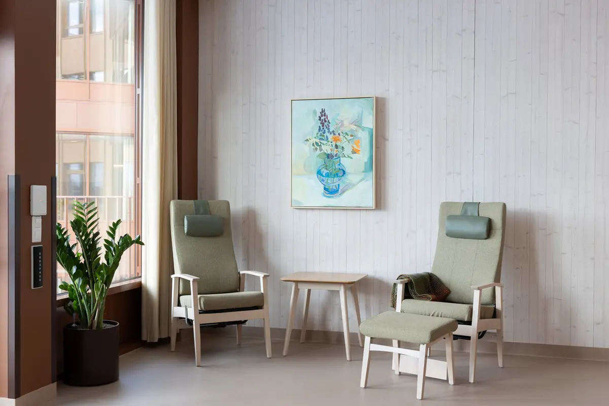 Stilleben av blomster i vase