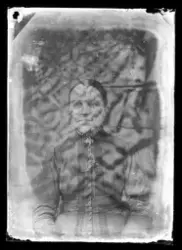 Porträtt av en kvinna.