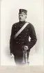 Porträtt av man i uniform.