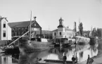 Kontorsbyggnad och det s k båtskjulet. Motala Mek. Verkstad.