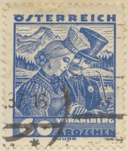 Frimärke med motiv av dräkter, nygift par från Körbersee i bröllopskläder från Vorarlberg, från Österrike 1934.