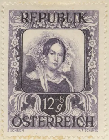 Frimärke med motiv av kvinnodräkt, från målning av Josef Kriehuber. Född i Wien (1800-1876), han gjorde nära 3000 porträtt av högreståndspersoner och ett hundratal akvareller. Från Österrike 1947.