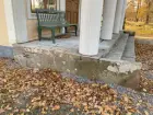 Lusthuset i Mackmyra brukspark efter avslutade arbeten. Sidostyckena är justerade, liksom de ovanliggande stenhällarna.