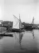 Miljön vid Rosenviks varv på Djurgården. Vy från bron från Beckholmen 1904.