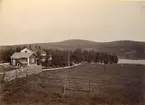 Vy över landsbyggsmiljö vid byn Tänger, Envikens socken, Falu kommun (enligt text i album).