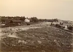 Parti af Vintjärn med stationshuset till vänster (enligt text i album).