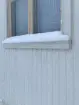Kungsbergs bönhus, närbild på panel, fönsterfoder och fönsterbågar.