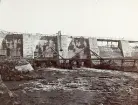 Uppbyggnaden av de massiva regleringsdammarna vid uppförandet av Älvkarleby kraftverk, omkring 1906 (enligt text i album).