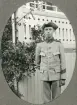 En ung man i militäruniform (m/10), poserar vid en glasveranda. 
Trol. Yngve Sämund Svensson (1895-1973), Alvesta, bror till Ruth Svensson.