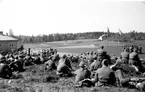 Oidentifierad ceremoni i fält.