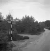 Vägskyltar mot Hjo, Tibro och Bredvik