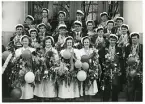 Studentexamen, 2:a dagen, 19/5 1940, Gävle. Text baksida kort: Jonte Jardal, M-B Ohlsson, Rune Lundström, A-L Pettersson, H. Åberg, S. Tillman, Åke Karlbom, R. Andersson, J. Höök, Gustaf Frieberg, C-H Calander, M. Wiberg, Anders Gräslund, J-E Nyberg, Börje Landfors, Birgit Johansson, H. Nyström, Leif Rainer, Sven Andersson, G. Norlander, E. Palm.